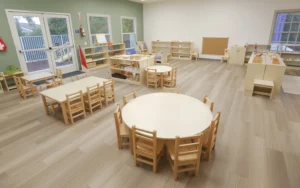 Complete Montessori Primary Casa classroom set for ages 3-6 featuring practical life, sensorial, mathematics, language, and cultural materials with child-sized wooden furniture